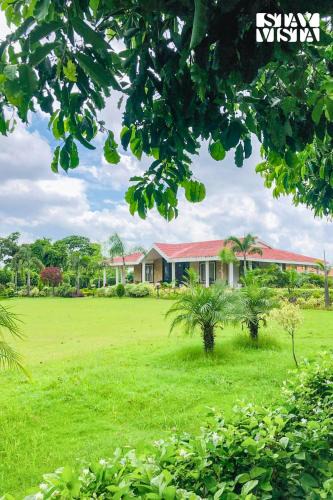 Bhojpur Villa | StayVista's The River Villa - Pet-Friendly Riverside Villa with Lawn & Bonfire
