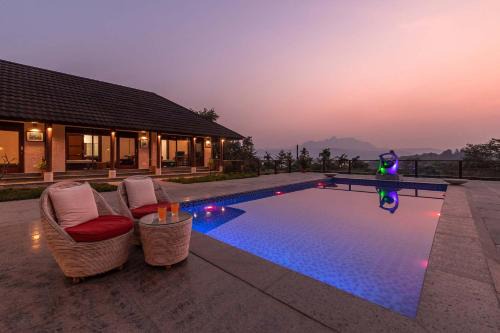 Lonavala Villa | StayVista's Vyoman Villa - Experience a valley view, lush lawn, spa, and yoga retreat