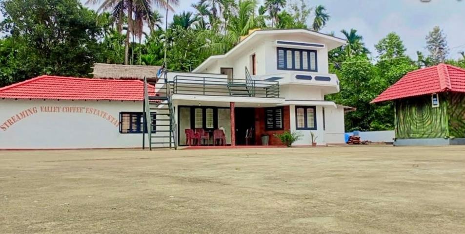 Madikeri House | Streaming valley coffee estate stay