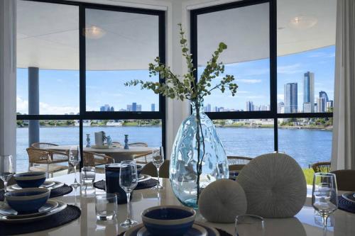 Mermaid Waters House | Stylish Canalfront Paradise with Designer Interiors