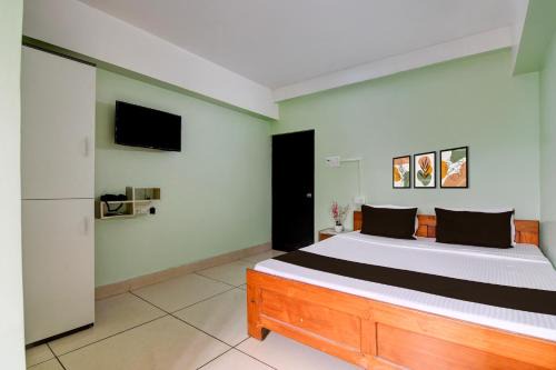 Jalpaiguri Hotel | Super Collection O Jalpaiguri Formerly Greater Kailash