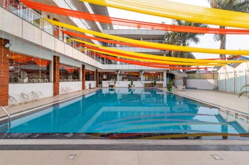 Bullawala Hotel | Treebo Arya Palace With Swimming Pool