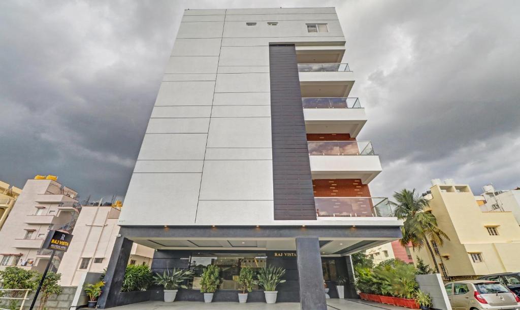 RR Nagar Hotel | Treebo Premium Raj Vista Global Village