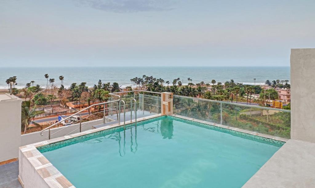 Bheemili Hotel | Treebo Seabreeze Comforts With Swimming Pool