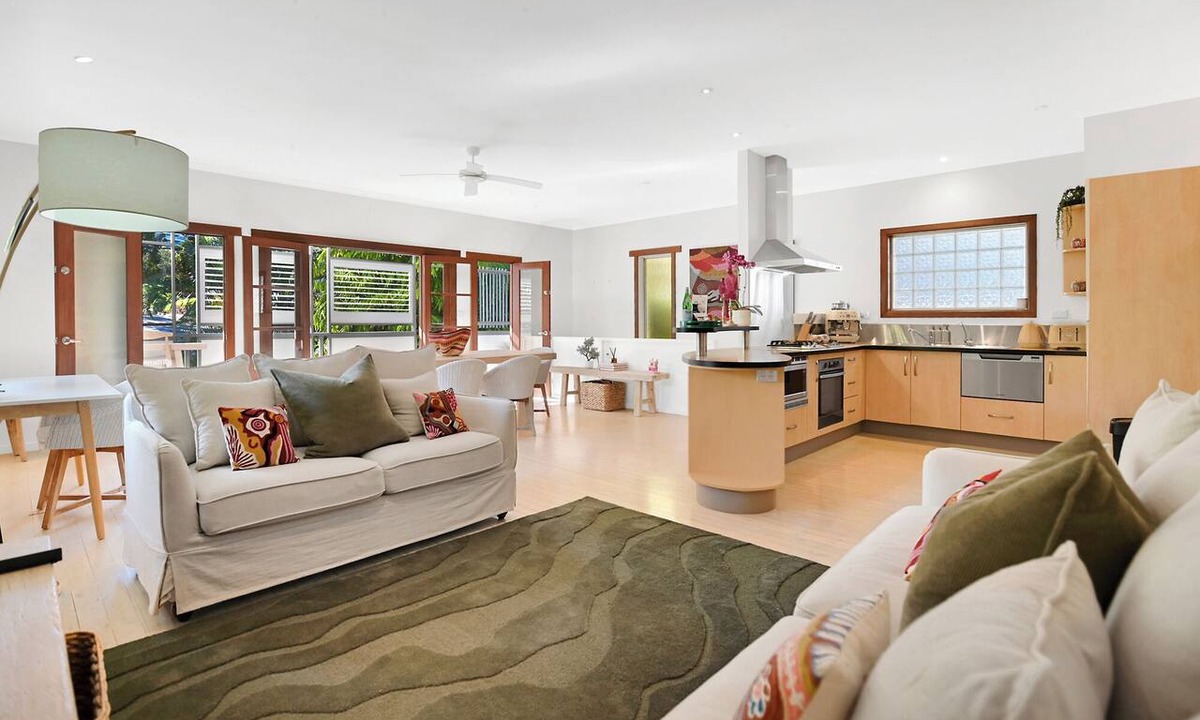 Burleigh Heads House | Where tropical gardens meet Burleigh's laid-back lifestyle. Spend your days by the plunge pool, stroll to the beach, and create unforgettable memories with family and friends.