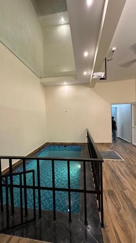Mandavi Villa | Wind & Wave Villas, Luxury 3BHK Villa with Indoor Pool & Poolside Cinema Projector