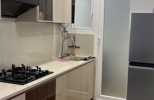 Mayapur Apartment | 2-bedroom modern condominium with hill views