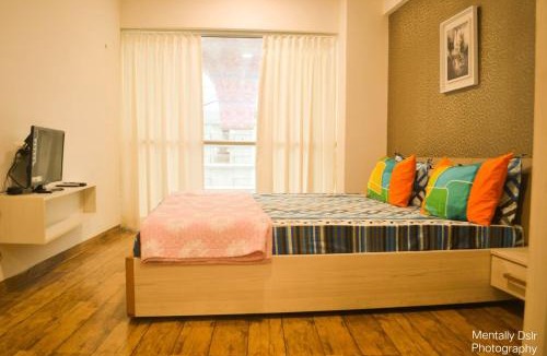 Dumas Apartment | 7 star Weekend studio at Rajhans Belliza by Global Hospitality