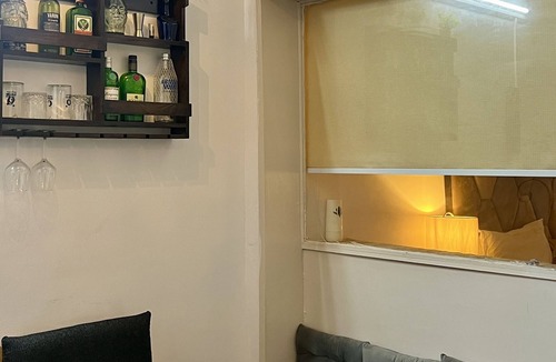 Hauz Khas Village Apartment | A king size bed and urban retreat in the heart of Hauz Khas Village.