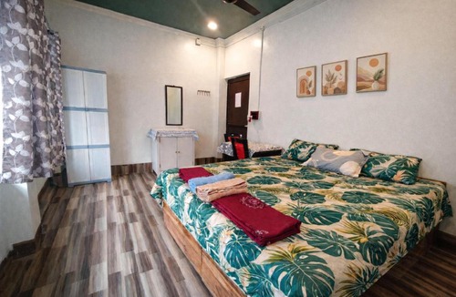 Tollygunge House | ac room with kitchen and Terrace