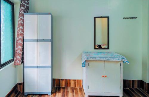 Tollygunge House | ac room with kitchen and Terrace