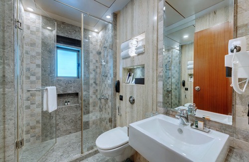 Girgaon Hotel | Adiva Residency Beacon, Grant Road, Mumbai