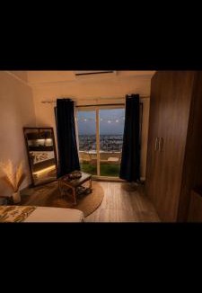 Greater Noida Apartment | Aesthetic High-Rise Studio , Balcony & Villa View