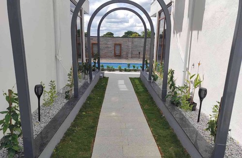 Chikkaballapur House | Amara Kosha Misty Hills - Skanda - Swimming Pool, Private Jacuzzi & Movie Room