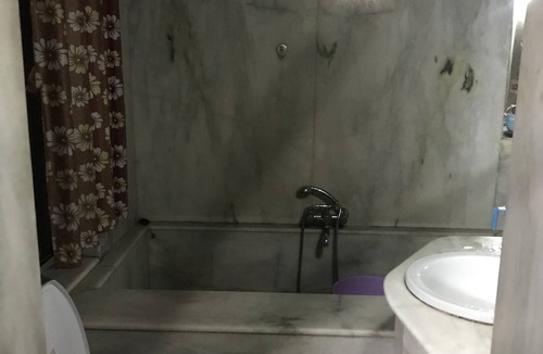 Koregaon Park Apartment | Amazing Marble Bedroom with Romantic Tub