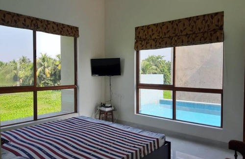 Vedic Village Villa | Aqua Golf Villa in Vedic Village Resort