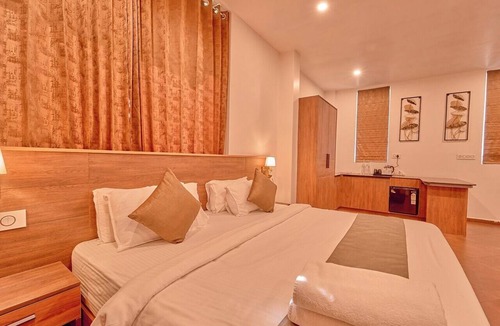 Pallivasal Hotel | Areva Inn Munnar by Voye Homes