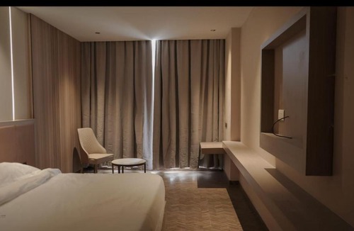 Theni Hotel | Ask Grande