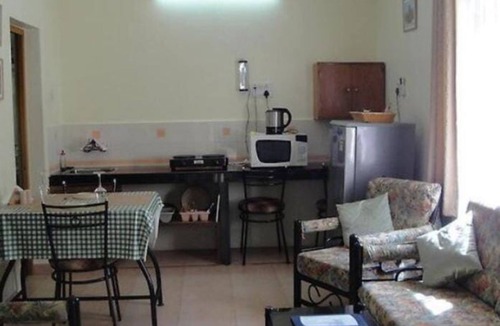 Fatona Apartment | Authentic Goa Home Surrounded by Coconut Palm Trees & Pool at Sandray