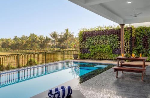 Parra Villa | Avalon by Hireavilla - 6BR Villa with Pool & Field View in Parra, North Goa