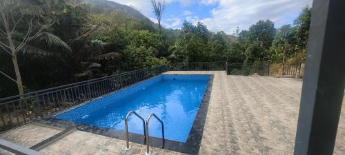 Todupulai House | Bell Farms, Vagamon