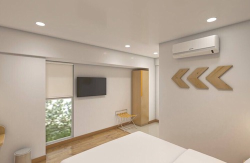 Hoysala Nagar Hotel | Bloom Hotel CMH Road