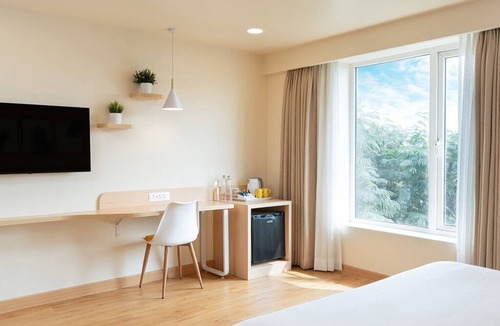 Ahmedabad Hotel | Bloom Hotel SG Highway
