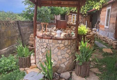 Calan House | Căsuța cu cerdac