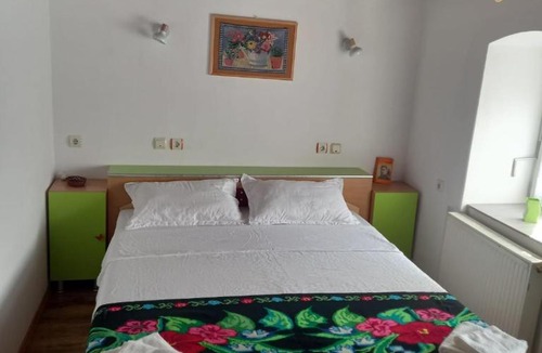 Calan House | Căsuța cu cerdac