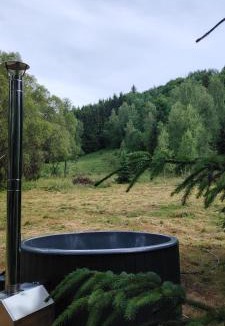 Risca Ski Chalet | Casuta dintre brazi