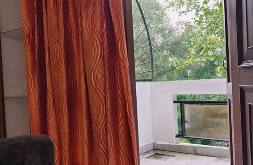 Chittaranjan Apartment | Charming 3BHK Retreat in Peaceful Greater Kailash 1