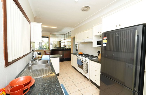 Roselands House | Charming Family Home with Swimming Pool in a Convenient Location