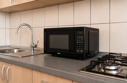 Oradea Apartment | City Oasis Studio in Oradea with Balcony Fast WiFi Self Check-in AC