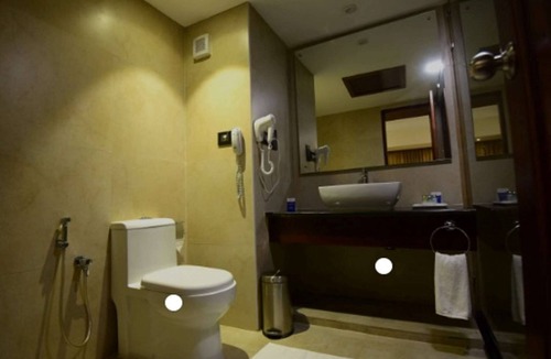 Thampanoor Hotel | Classic Sarovar Portico Thiruvananthapuram