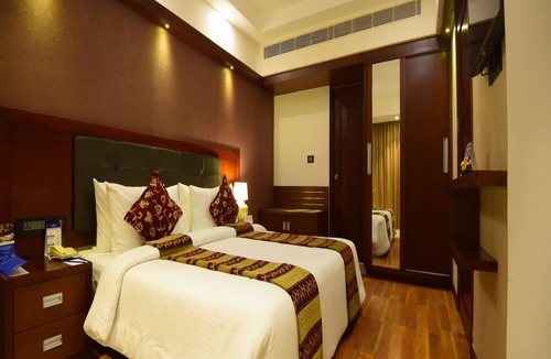 Thampanoor Hotel | Classic Sarovar Portico Thiruvananthapuram