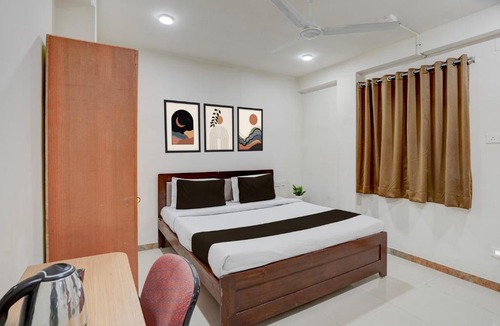 Vadodara Hotel | Collection O Vadodara Airport Formerly Milan Party Hall