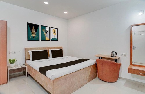 Vadodara Hotel | Collection O Vadodara Airport Formerly Milan Party Hall