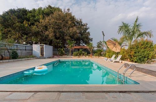 Doddaballapur Villa | Courtyard Banyan Rustic 2 BHK villa with pool banyan gazebo and open courtyard living