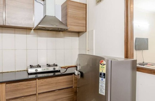 Chittaranjan Apartment | Cozy 2BHK with Private Terrace in GK1 – Walk to M Block Market!
