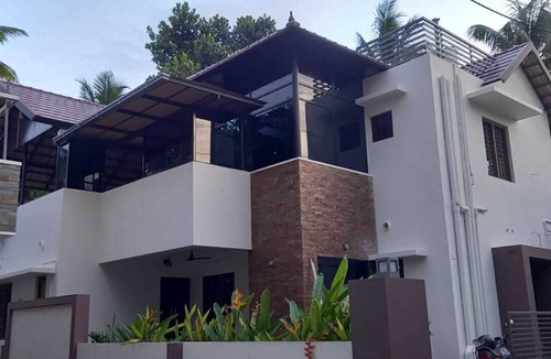 Nedumangad House | Cozy modern hideout on the outskirts of city help you freak out in silence .