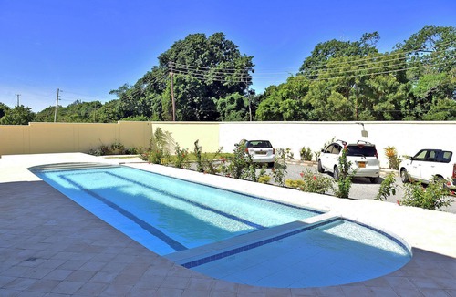 Galu Beach House | Cozy studio in peaceful Diani located in a leafy and serene neighborhood