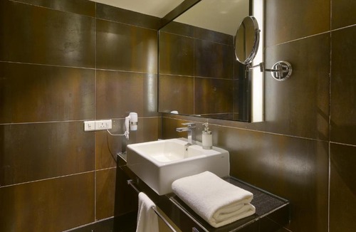 Koramangala Hotel | Davanam Sarovar Portico Suites