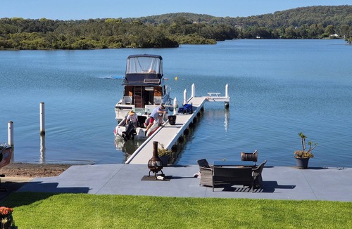 Fennell Bay Apartment | Direct water front 3 meters from Lake. Your own private balcony overlooking Lake