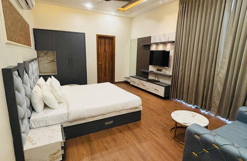 Jaipur House | Escape to the Rhythm of Serenity at Symphony Farms Jaipur.