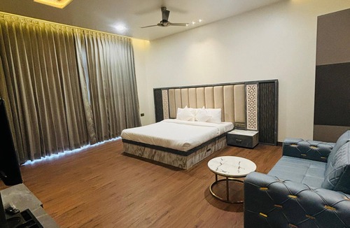 Jaipur House | Escape to the Rhythm of Serenity at Symphony Farms Jaipur.