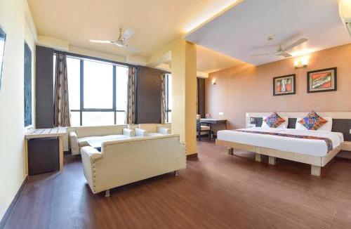 Adarsh Nagar Hotel | FabHotel Apex Intercontinental - Nr Pink Square Mall