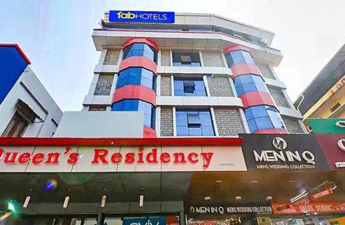 Shenoys Hotel | Fabhotel Central Queens Residency