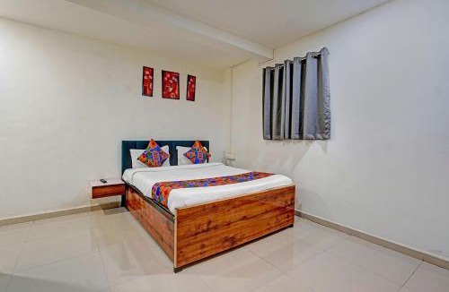 Rajgurunagar Hotel | FabHotel Pearl Inn