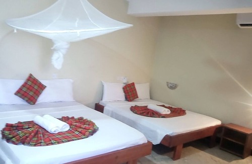 Stone Town Bed & Breakfast | Featuring free WiFi, Rooftop Cafe , close to ferry terminal & City attractions
