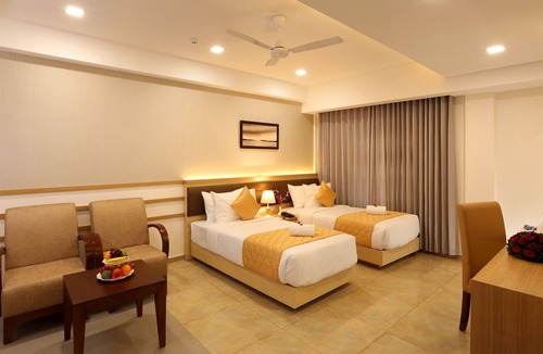 Aluva Hotel | Flora Charishma Residency Aluva